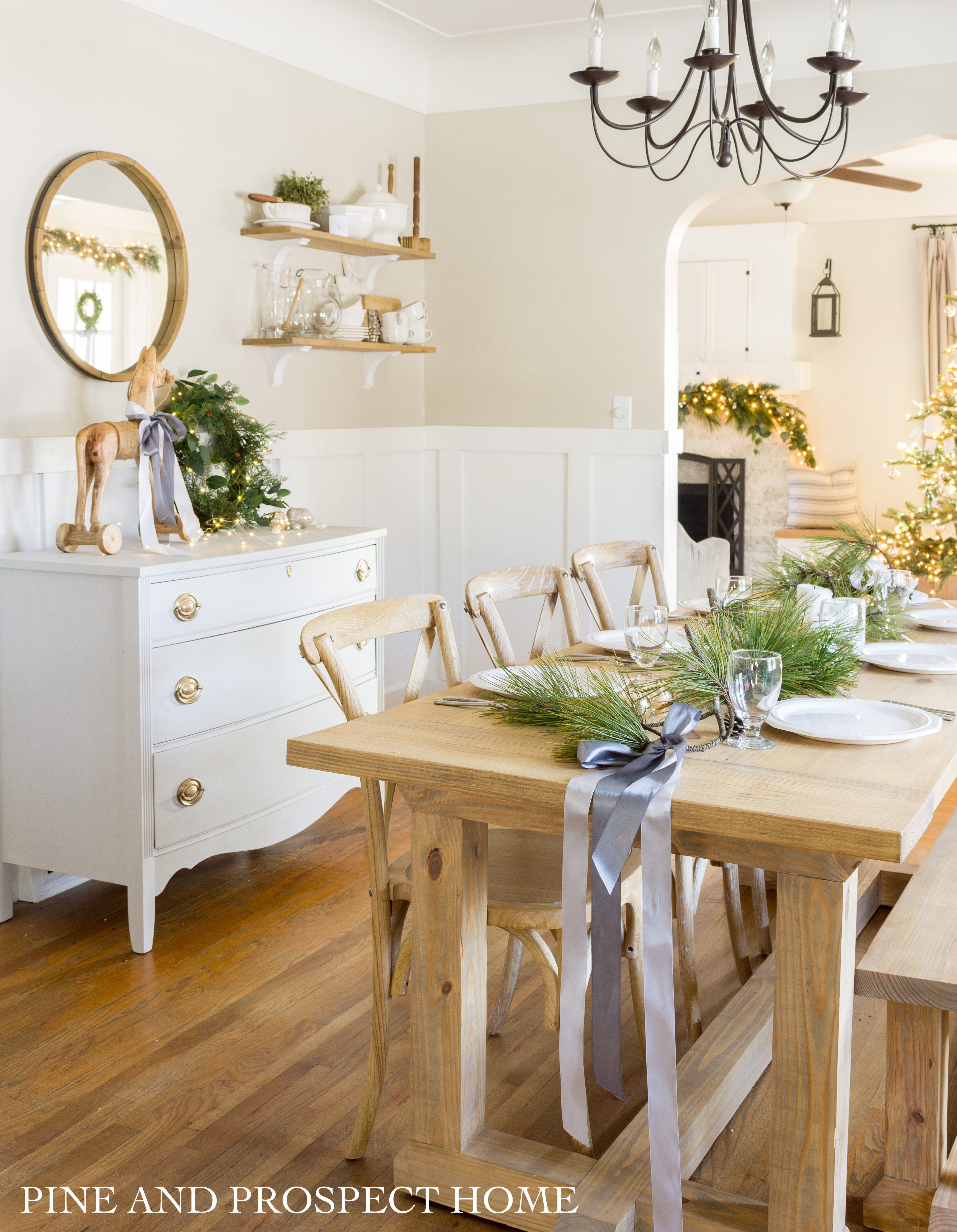 Simple Christmas Table with ribbon and pine branches