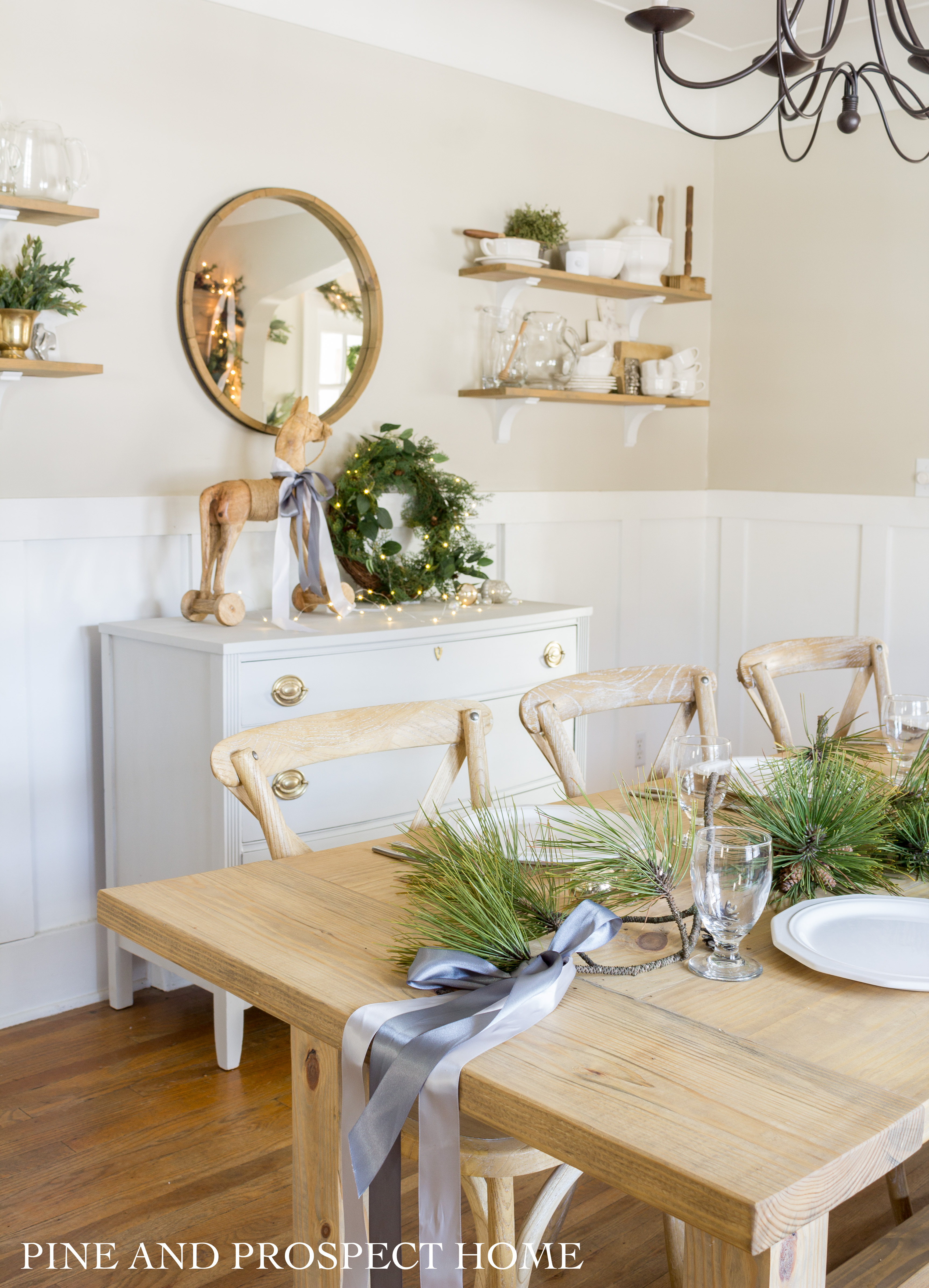 Ribbon and pine branches make for a simple yet beautiful Christmas table!