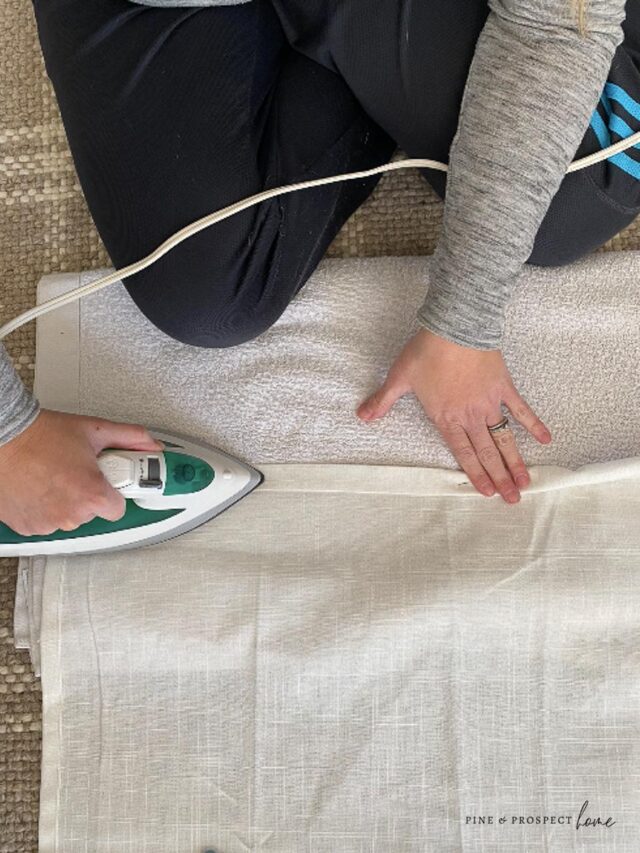 Ironing bonding tape on no sew hemmed curtains