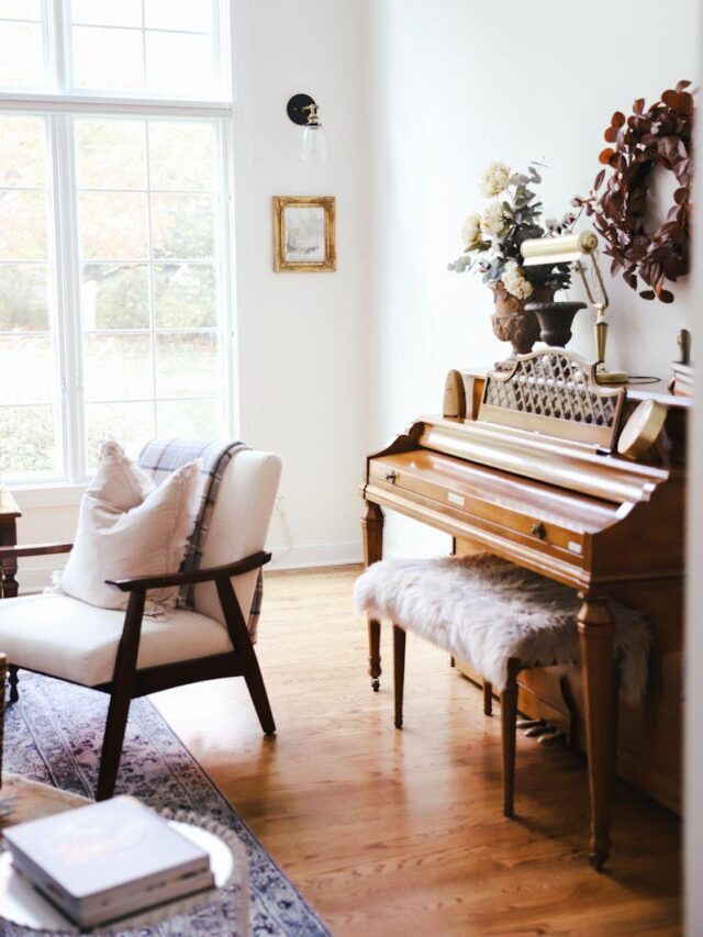 Piano and other vintage pieces incorporated into interior design of home