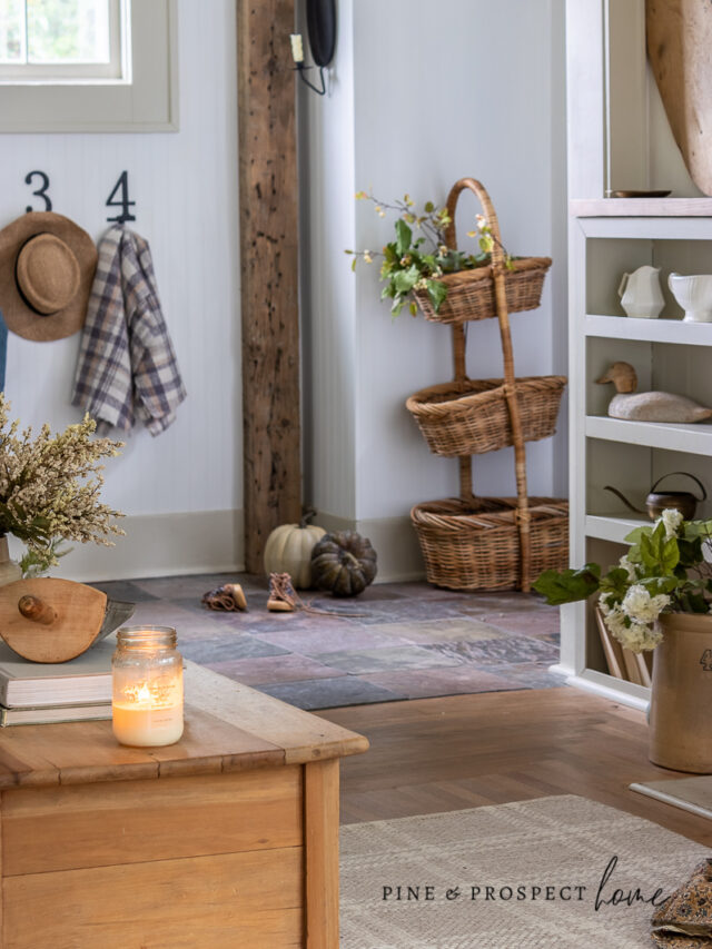 cottage entryway decorated for fall