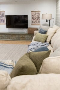 Basement sectional sofa with throw pillows