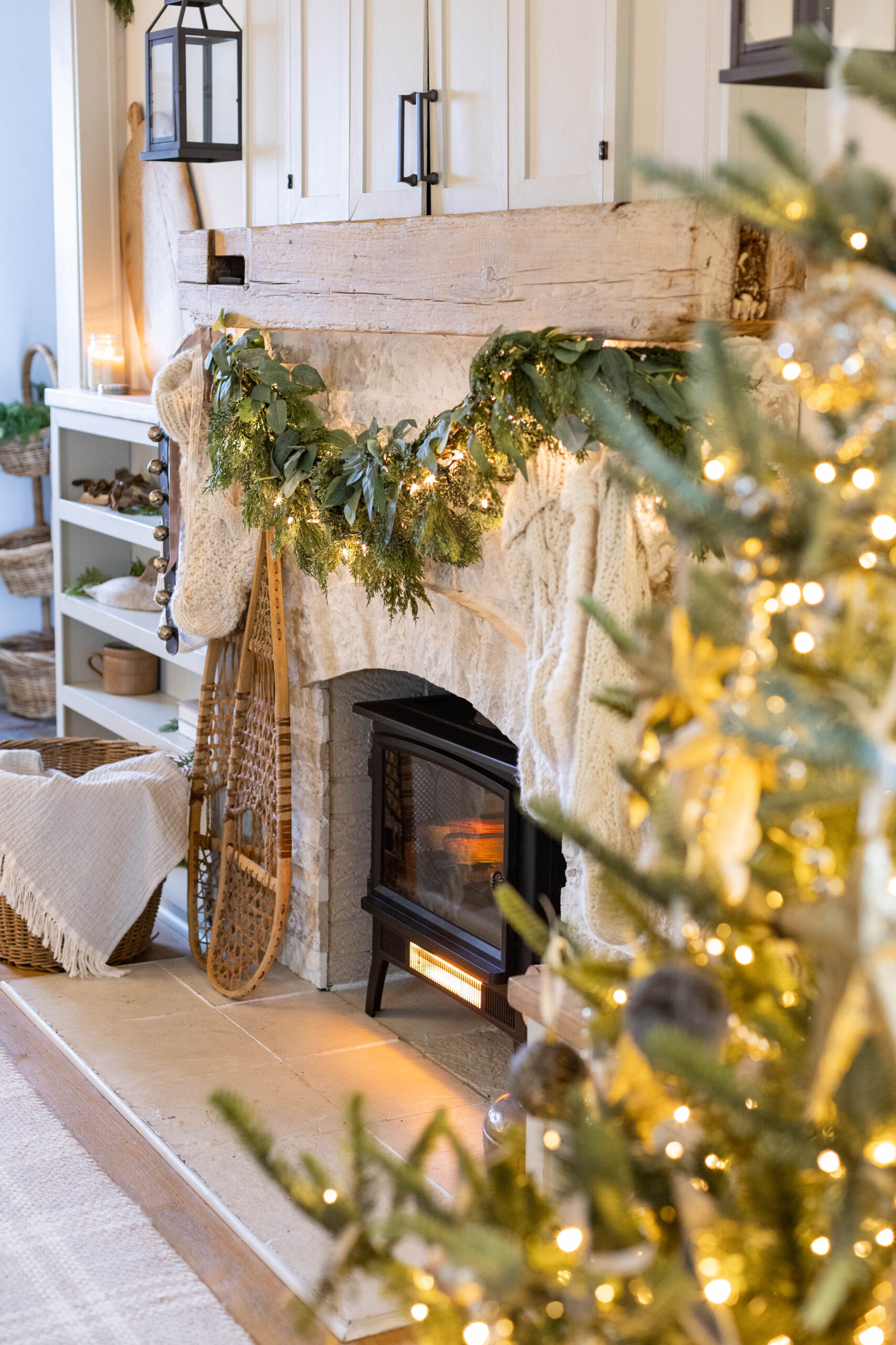 Christmas mantel with vintage snowshoes