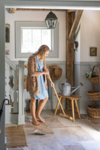 Cottage entryway makeover with new staircase spindles