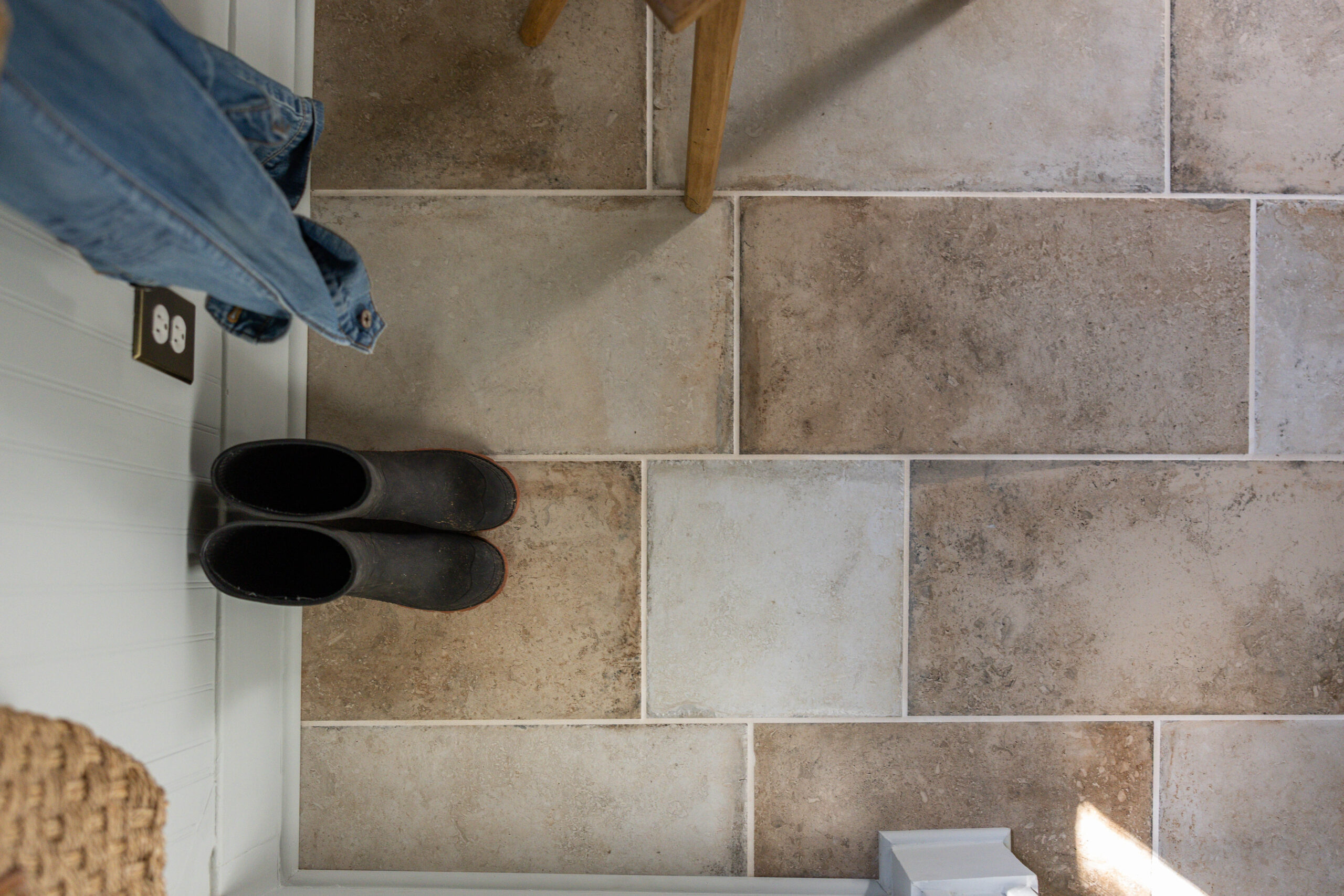 Cottage entryway porcelain tile floors
