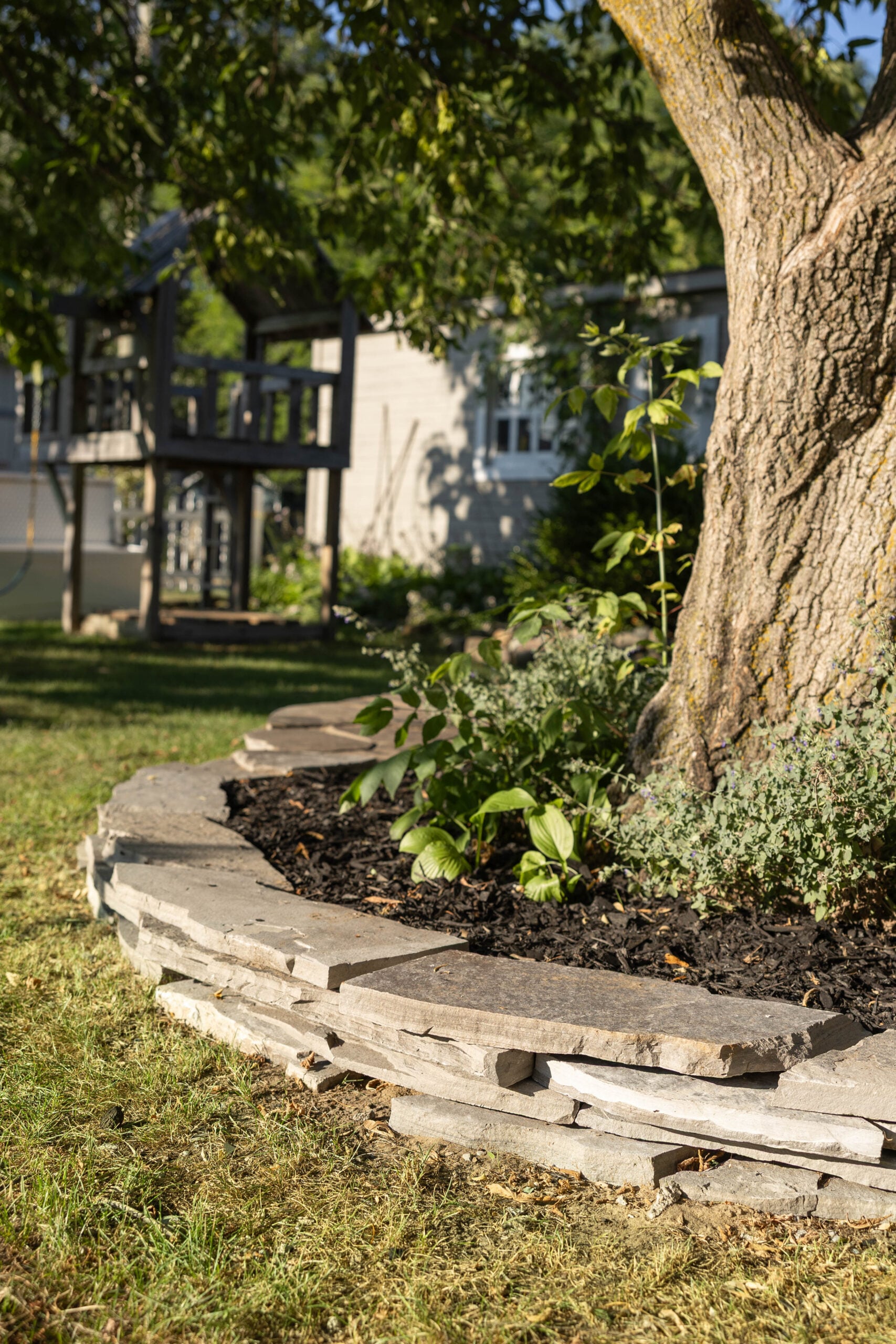 Retaining wall around diy flagstone patio